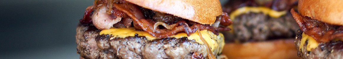 Eating Burger Cheesesteak at Chartroose Caboose restaurant in Lenexa, KS.